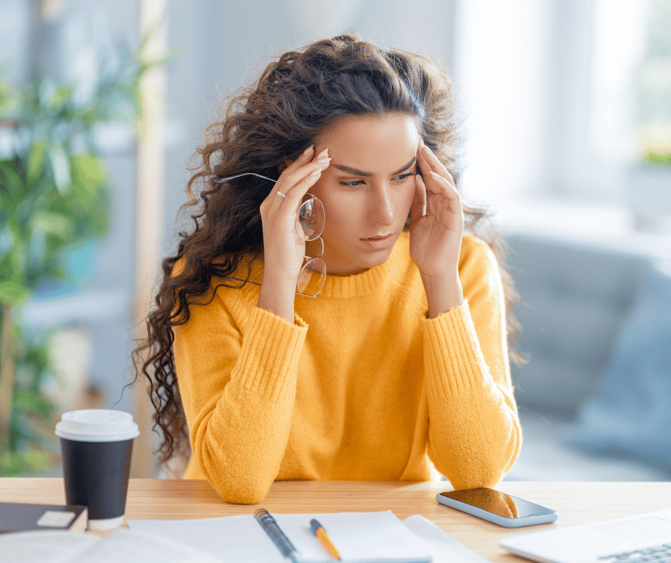 Image of woman with migraine pain. 